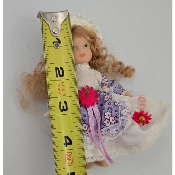 4.5 inch Miniature Doll with a Purple Dress and a White Hat - Picture 9 of 10